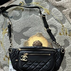Chic Black Quilted Crossbody Bag with Gold Accents
